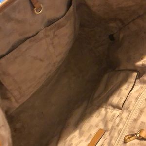 Brown and gold purse